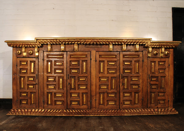 Sideboard reconstructed from antique fragments and reclaimed wood.