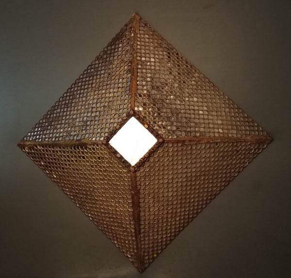 Diamond shaped Reflector Mirror encrusted with small pieces of mirror and gold leaf over wood.
