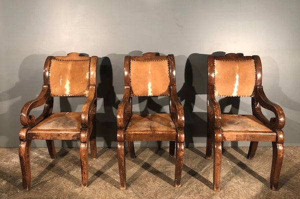 Three Mesquite and Cowhide Chairs from Mexico

.