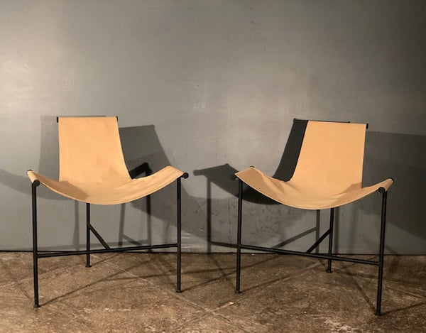 Three legged Iron and Canvas Patio Chairs.
