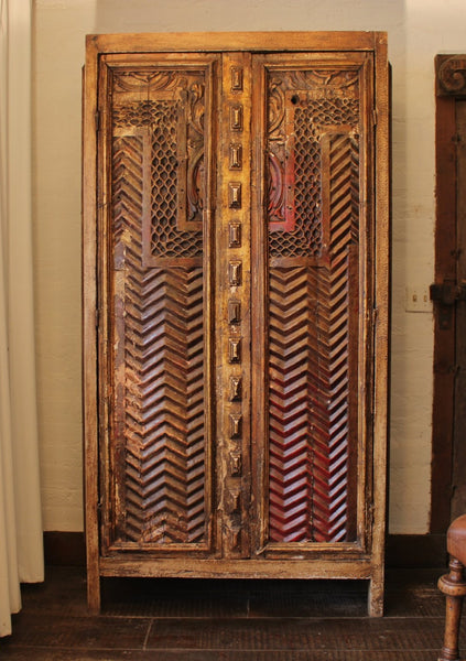 Armoire reconstructed from antique reclaimed wood panels.