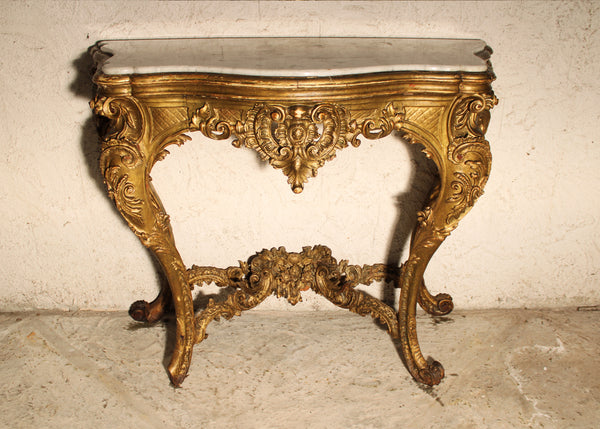 Console with gold leaf and marble top