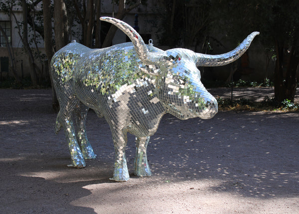 Disco Bull made from thousands of 1” square Mirror Ball mirrors with fiberglass and metal structure.
